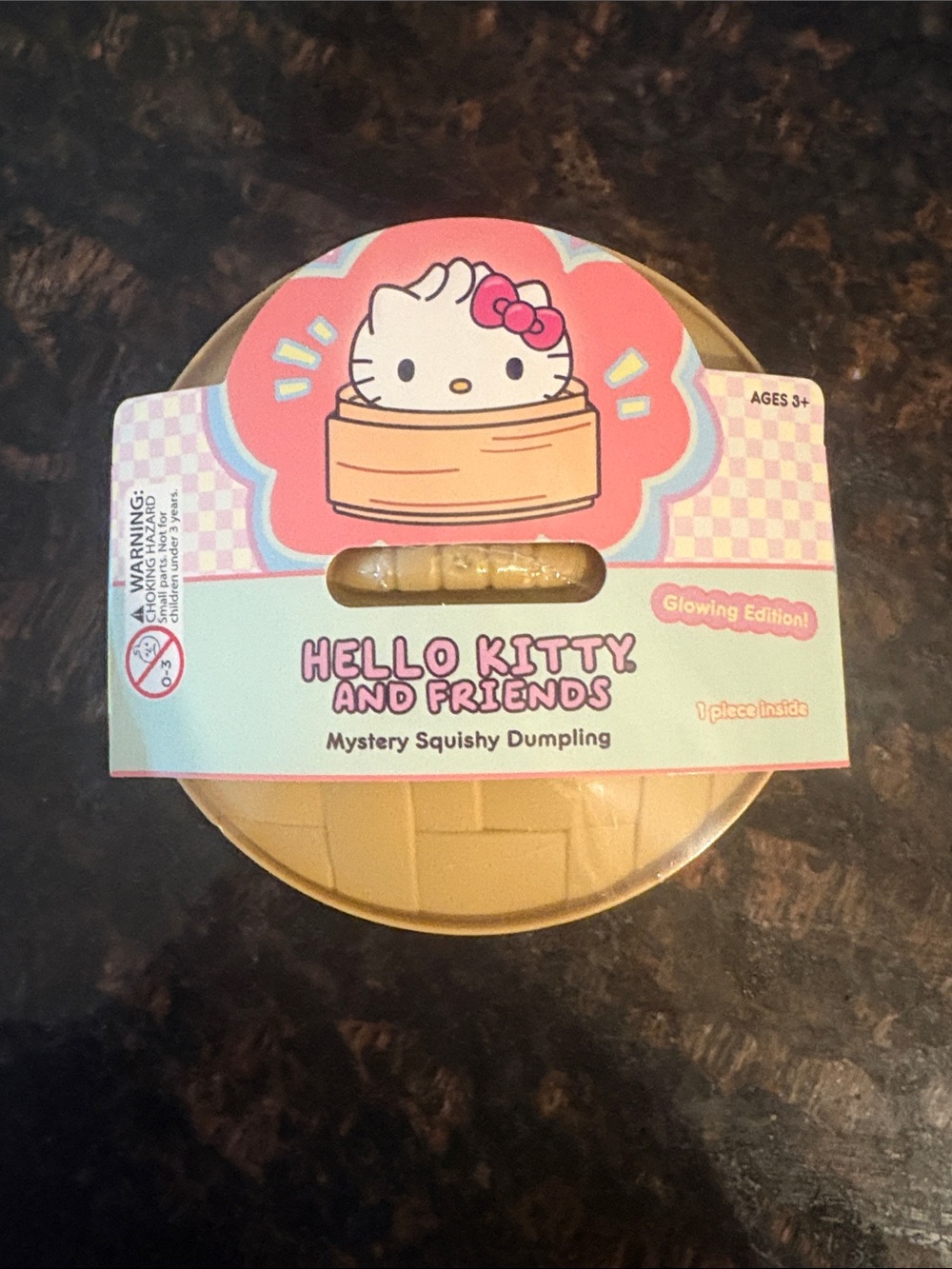 Glowing hello kitty Mystery Squishy Dumpling - Pink & Cream
